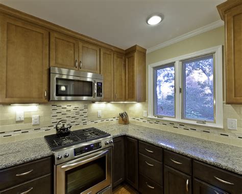 New Caledonia Granite Dark Cabinets Backsplash Ideas