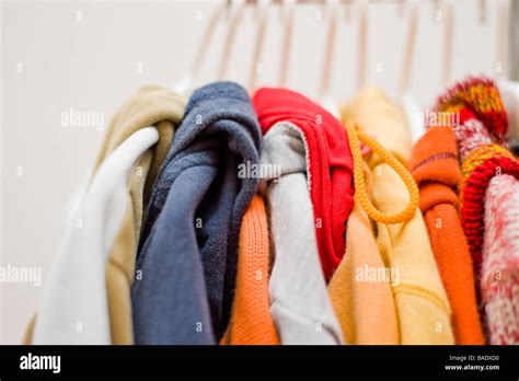 Clothes Hanging in Closet Stock Photo - Alamy