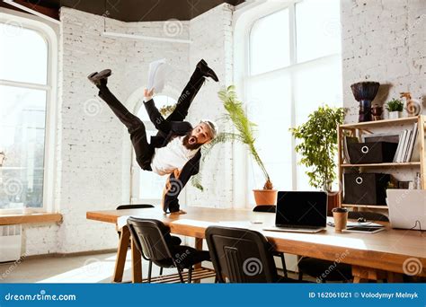 Businessman Having Fun Dancing Break Dance in the Office at Work Stock ...