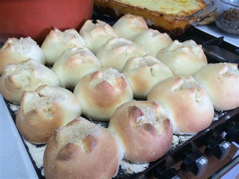 bread rolls sitting on top of an oven