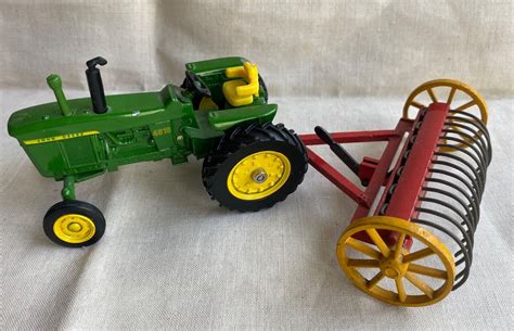 Vintage toy John Deere tractor with 1950's | Grelly USA