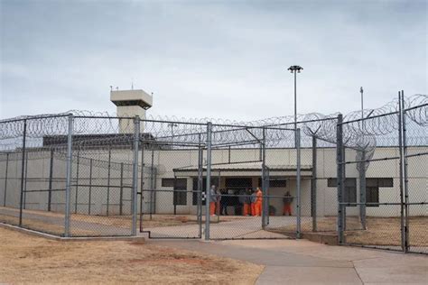 Inmates lining up to receive their medication at Joseph Harp ...