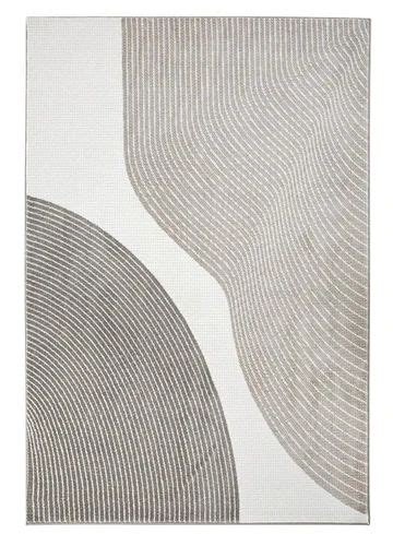 a white rug with grey circles on it