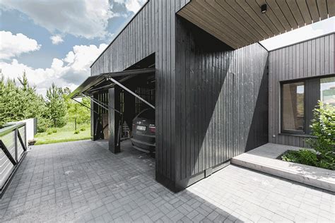 Black Box House / PAO Architects | ArchDaily Siding Paint, Wood Siding, Vilnius, Black Box ...