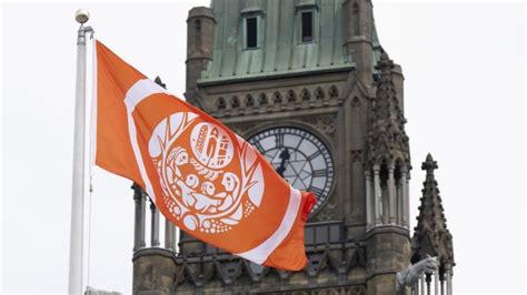 Flag raised on Parliament Hill to honour residential school survivors | CBC News