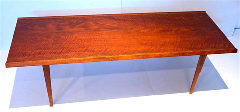 1950s Danish Modern walnut coffee table with raised edge at 1stDibs