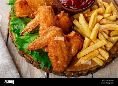 Chicken wings and fries hi-res stock photography and images - Alamy