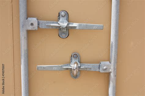 Crate door lock mechanism Stock Photo | Adobe Stock