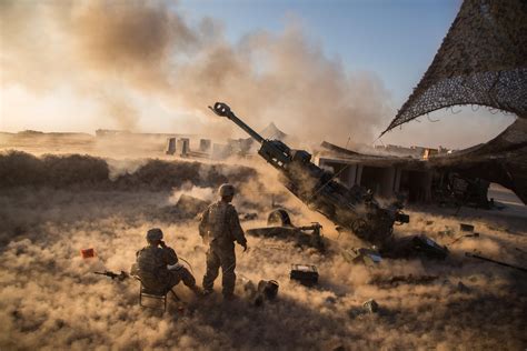 U.S. Soldiers firing a M777 A2 Howitzer (from r/CombatFootage, u ...