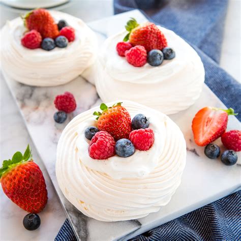 Meringue Nests with Berries and Vanilla Cream - The Busy Baker