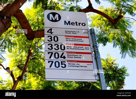 LA Metro Bus Stop sign on Santa Monica Blvd, West Hollywood Stock Photo - Alamy