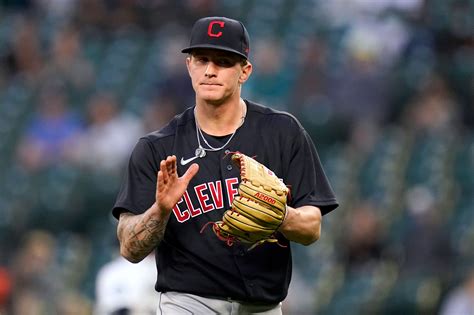 Indians' Zach Plesac injured 'aggressively ripping off' shirt