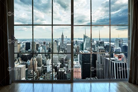 Manhattan cityscape view from high-rise window with curtains in luxury – NY Clips