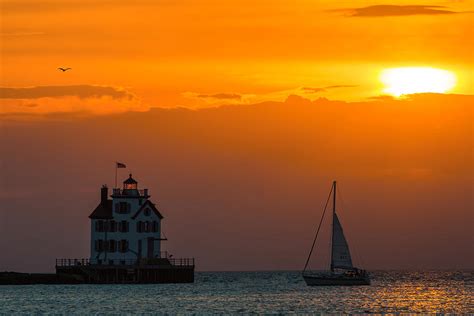 Sunset At Lorain Lighthouse Photograph by Dale Kincaid - Fine Art America