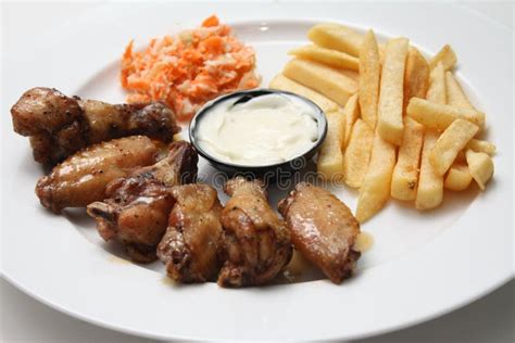 Chicken Wings With Fries Stock Photos - Image: 15693343