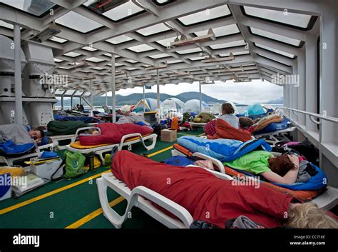 Passengers sleeping in the solarium. Ferry to Alaska. Inside Passage ...