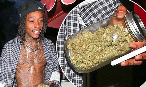 Wiz Khalifa clutches jar of weed as he arrives at LA nightclub | Daily ...