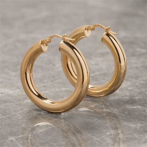 thick hoop earrings in gold or silver by loel & co. | notonthehighstreet.com