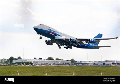 Jumbo jet taking off Stock Photo - Alamy