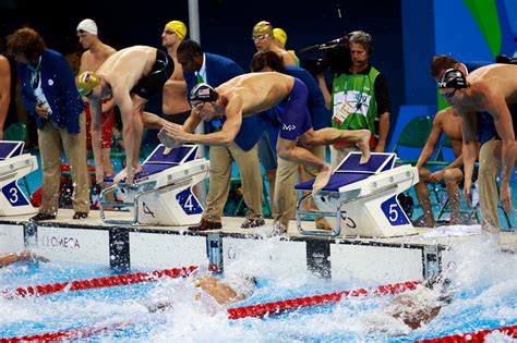 Michael Phelps Powers U.S. to Victory in 4x100 Relay, Winning a 19th ...