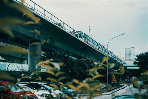 A train is crossing over a bridge · Free Stock Photo