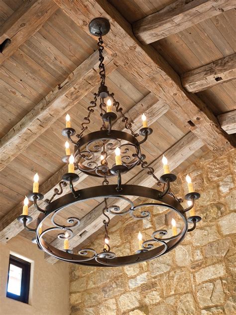 A rustic wood and metal chandelier adds a casual, authentic feel to ...