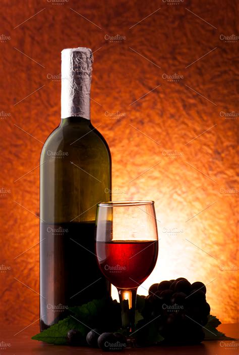 wine bottle with grapes ~ Food & Drink Photos ~ Creative Market