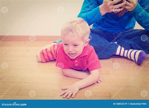 Crying child, tired father stock image. Image of headache - 58852579