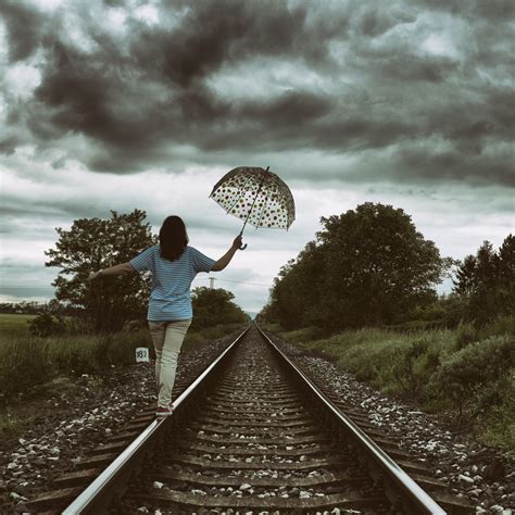 Girl On A Railroad Free Stock Photo - Public Domain Pictures