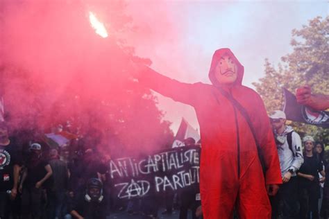 'We're Revolting!': Emmanuel Macron's Government Faces Over 100,000 Angry Protesters - Newsweek