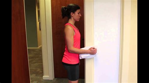 Standing Isometric Shoulder Internal Rotation With Towel Roll at Doorway - YouTube