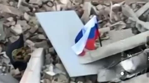 Ukraine war: Drone footage shows Russian flag at remains of Bakhmut city hall | World News | Sky ...