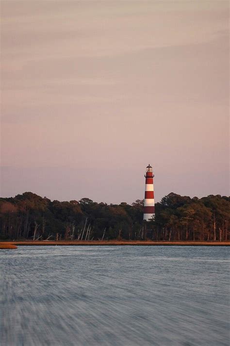 Chincoteague Island Virginia lighthouse at sunset | Chincoteague island, Island, Seattle skyline