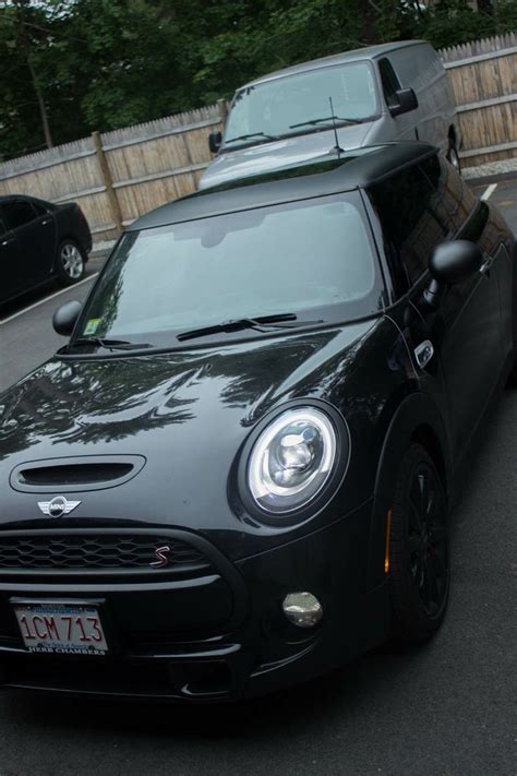 Matte black vinyl wrap on trim- 2014 Mini Cooper www.wewrapboston.com