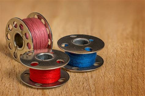 Do Bobbins Need to be Replaced? (What You Should Know!) - Gathering Thread