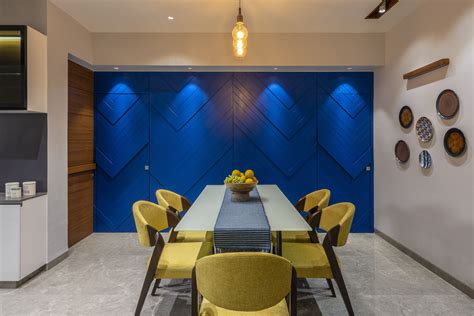 This 1,120 sq.ft Ahmedabad apartment has been designed by Studio Ignitus. #diningroom # ...