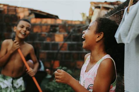 Laughing Children in Backyard · Free Stock Photo