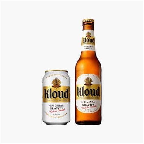 two bottles of kloud beer next to each other on a white background,