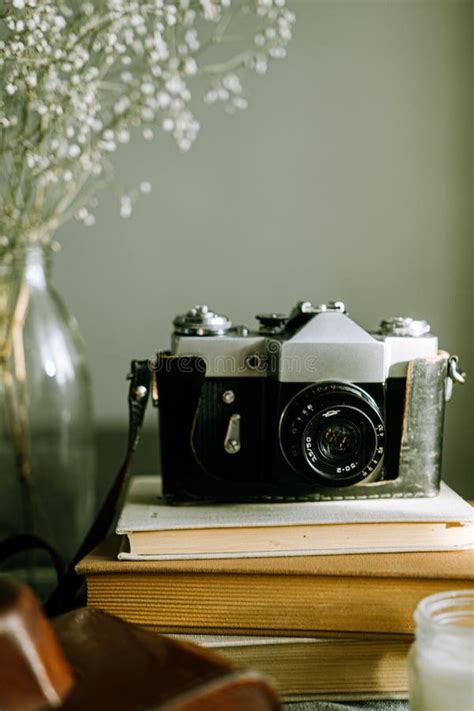 Vintage Photo Camera on Table Stock Photo - Image of design, camera ...