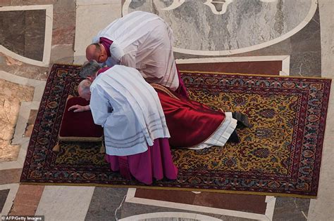 Pope Francis on the floor praying in the Vatican Good Friday service ...