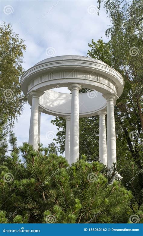 Greek Architecture. Ancient Architecture. White Rotunda in the Park. View of the Rotunda through ...