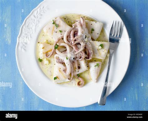 rustic mediterranean grill squid Stock Photo - Alamy