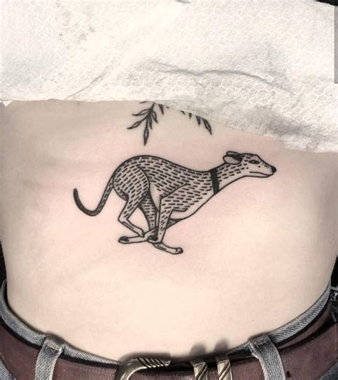 Running dog tattoo by Mikes Shaw inked on the center of the belly | Tattoos, Picture tattoos ...