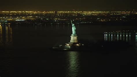 5K stock footage aerial video of tracking the Statue of Liberty and Liberty Island in New York ...