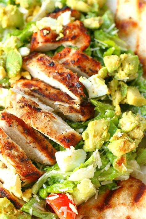 Perfectly grilled chicken with tasty avocado & Parmesan cheese over a ...