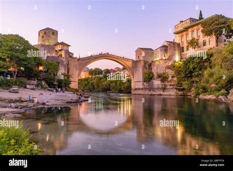 Mostar Bridge at sunset time, an Ottoman bridge in Mostar, Bosnia and ...