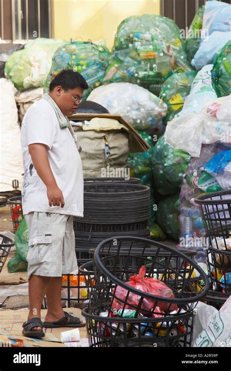 Man At Recycling Station, Taiwan Stock Photo - Alamy