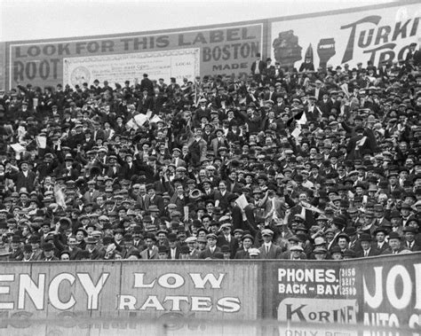 AT THE WORLD SERIES, 1916: A crowd packs the bleacher to cheer the Boston Red Sox in the first ...