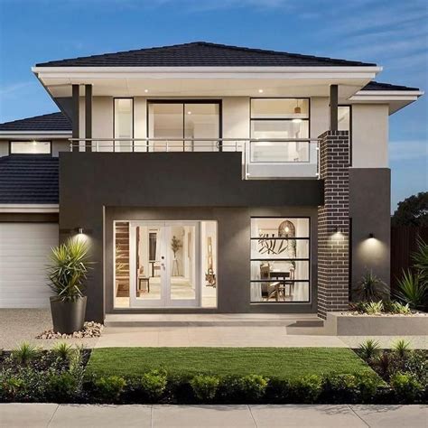 Unique and stunning Modern 2 story house is designed in a two tone exterior paint with white ...