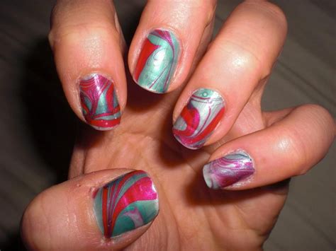 Hot pink and turquoise first time marbling my nails | Nails, Nail polish, Hot pink